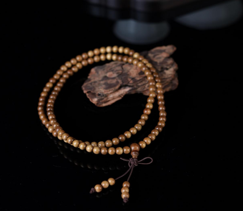 金丝楠老料横切面图片_金丝楠木摆件寓意_金丝楠木手串价格