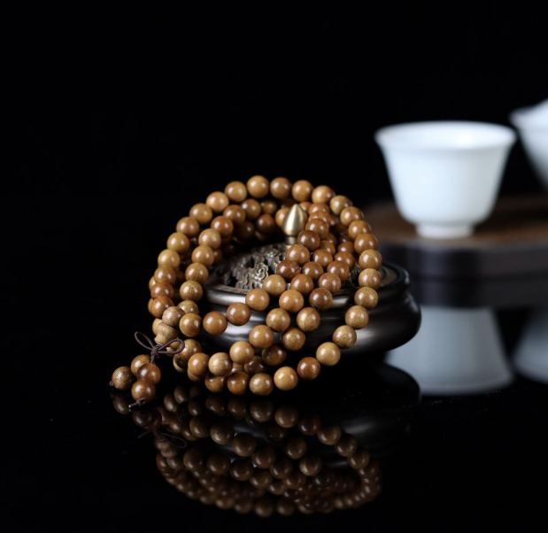 金丝楠木手串价格_金丝楠老料横切面图片_金丝楠木摆件寓意