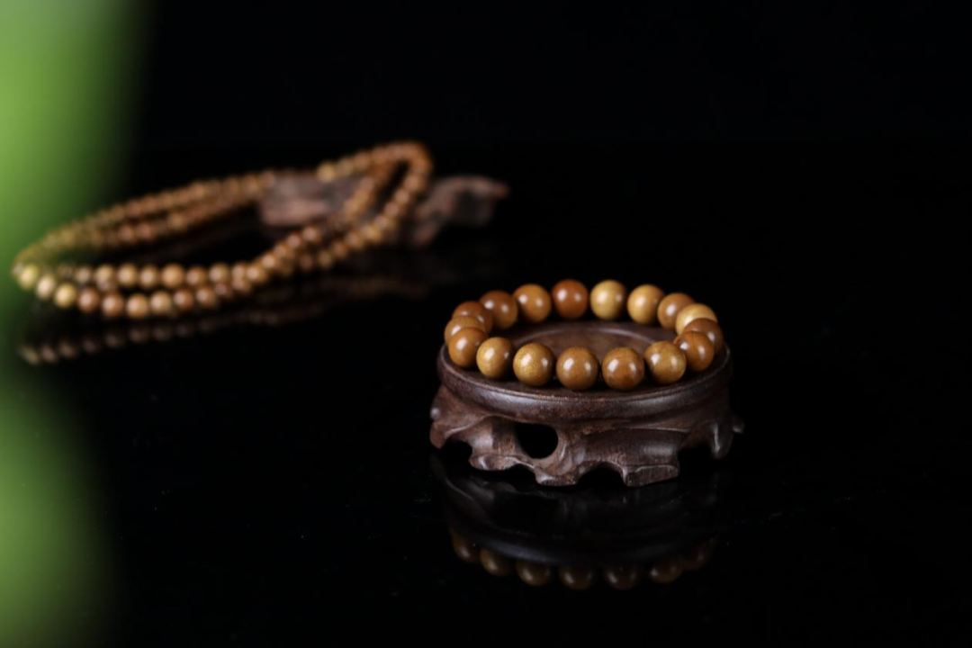 金丝楠老料横切面图片_金丝楠木手串价格_金丝楠木摆件寓意