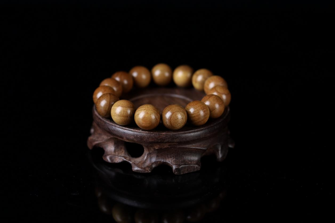 金丝楠老料横切面图片_金丝楠木手串价格_金丝楠木摆件寓意