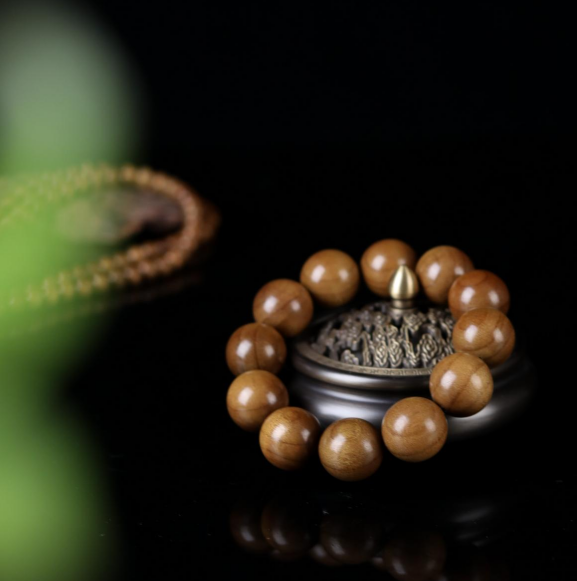 金丝楠老料横切面图片_金丝楠木摆件寓意_金丝楠木手串价格