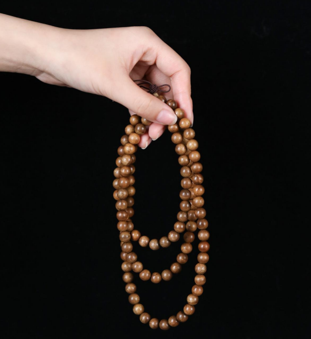 金丝楠木摆件寓意_金丝楠老料横切面图片_金丝楠木手串价格