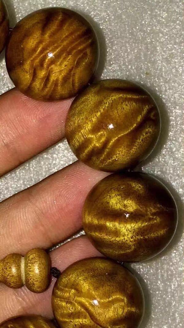 金丝楠老料横切面图片_金丝楠手串龙胆纹鉴别_金丝楠木特性与价值