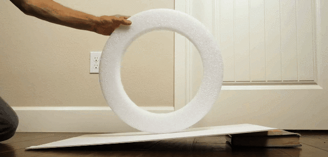 双锥体悖论_锥体上滚生活应用_锥体上坡现象